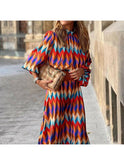 Marisol Vibrant Geometric Dress by Lumina Wear featuring bold colorful patterns and a fitted silhouette.