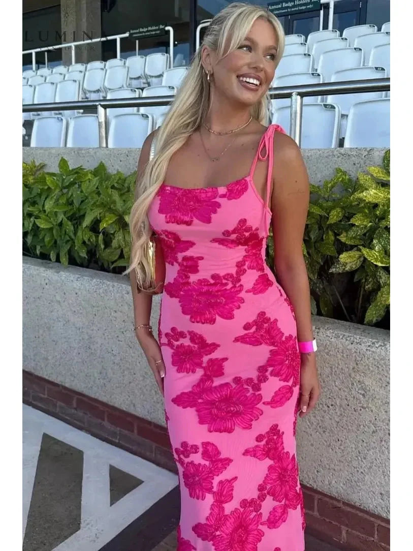 Pink floral knot-strap dress by Lumina Vancouver, perfect for wedding guests, shown in size 4-6 XS with a flowy, elegant design.