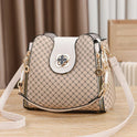 Black Lumina Wear Marjorie quilted charm handbag with adjustable strap, showcasing its elegant design and stylish craftsmanship.