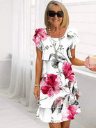 White MARVELLE™ Bloom Ruffle Dress by Lumina Vancouver, featuring feminine ruffles and a stylish design for special occasions.