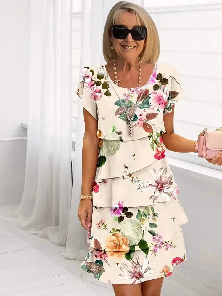 Lumina Vancouver MARVELLE™ Bloom Ruffle Dress in white, lightweight fabric with ruffle details, perfect for spring and summer wear.
