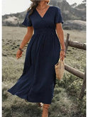 Lumina Wear Mary elegant green summer dress with V-neck, lightweight fabric, and stylish design for warm weather.