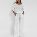 Light gray relaxed fit coordinated outfit set by Lumina Wear featuring a matching casual dress and comfortable design.