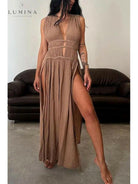 Beige Marylou boho maxi dress by Lumina Vancouver, perfect for holiday vibes, shown on a model with flowing fabric.