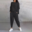Black Maya flowy lounge set with tapered pants by Lumina Wear, featuring a relaxed fit and comfortable design for women.