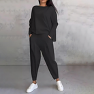 Black Maya women's lounge set with flowy top and tapered pants from Lumina Wear, comfortable and stylish for relaxed wear.