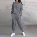 Black Maya Lumina Wear flowy lounge set with tapered pants, soft fabric, and relaxed fit for comfortable casual wear.