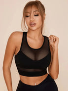 Black Lumina Vancouver mesh shockproof sports bra with supportive design and breathable fabric for active wear.