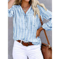 Lumina Wear Mia relaxed striped summer blouse with airy fit, featuring red and white horizontal stripes and lightweight fabric.
