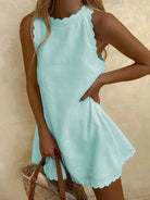 Light blue MIAMI™ casual elegant dress by Lumina Vancouver, displayed on a hanger with a soft, flowing fabric.
