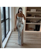Silver Michaela spaghetti strap shimmer maxi dress by Lumina Vancouver for girls' night out, shown on a young model.
