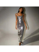 Silver Michaela spaghetti strap shimmer maxi dress by Lumina Vancouver, perfect for girls' night out, shown on a young girl.