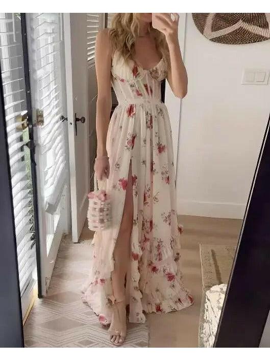 Pink Michela elegant floral dress by Lumina Vancouver, featuring a fitted silhouette and vibrant floral pattern.