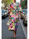 Lumina Wear Michelle elegant floral dress in size XS, showcasing a stylish, flowy floral design perfect for spring and summer occasions.