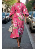 Lumina Wear Michelle elegant floral dress in size XS with vibrant floral pattern, displayed flat on a white background.