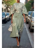 Lumina Wear Michelle elegant floral dress in size XS, featuring a stylish flowy design with vibrant floral patterns.