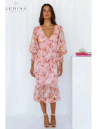 Pink Milla flower dress by Lumina Vancouver, elegant wedding guest dress with floral design and flattering fit.