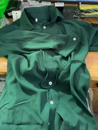 Green Sade button-up mini dress with tie waist by Lumina Vancouver, shown on a model.