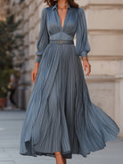 Steel blue pleated midi dress by Lumina Wear, featuring a flowing maxi design with elegant pleats and a sophisticated silhouette.