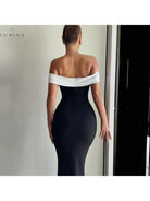 Lumina Vancouver Morgana off-shoulder contrast maxi dress in old money style, flowing fabric with elegant neckline and sophisticated design.