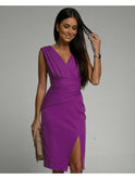 Red Nadinee V-neck dress with side slit from Lumina Wear, showcasing its elegant fit and flowing fabric.