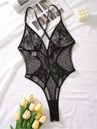 Lumina Vancouver Naomi Josette Bodysuit in size small, featuring a sleek, fitted design with long sleeves and a scoop neckline.