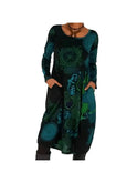 Blue Nerina artistic printed dress by Lumina Wear featuring vibrant abstract patterns and a flowing silhouette.