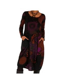 Blue Nerina artistic printed dress by Lumina Wear, showing intricate patterns and flowing fabric, perfect for stylish occasions.