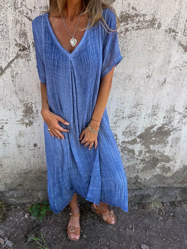 Blue NIA™ maxi dress by Lumina Vancouver, flowing chiffon fabric, elegant design, perfect for summer occasions.