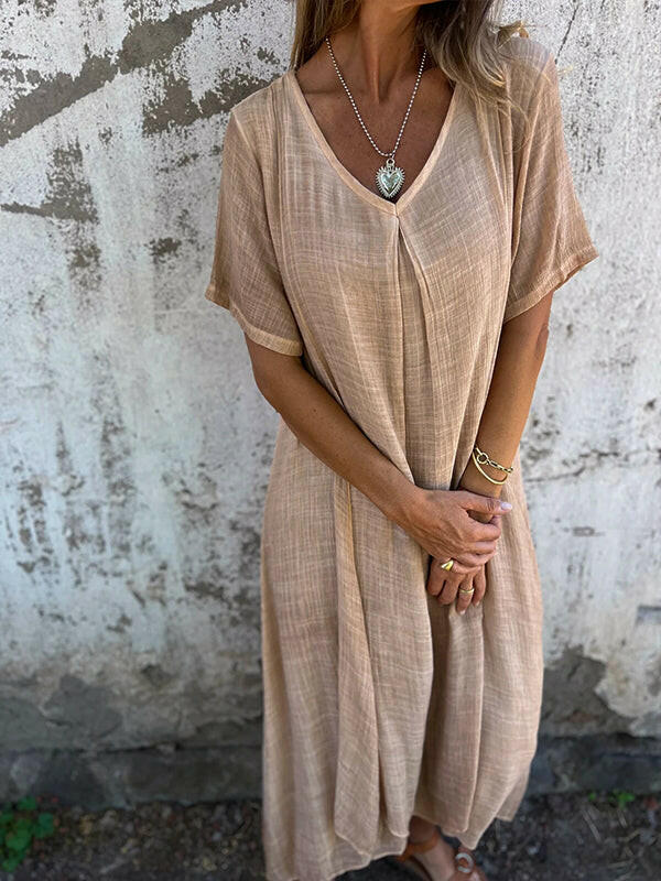 Blue NIA™ maxi dress by Lumina Vancouver, flowing fabric and elegant design, perfect for summer or special occasions.