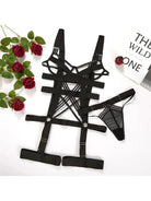 Lumina Vancouver Noelle S Bodysuit, close-up of fitted black bodysuit with long sleeves and scoop neckline.