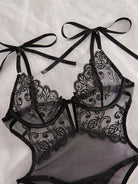 Noemi S bodysuit by Lumina Vancouver, featuring a sleek, fitted design with long sleeves and a high neckline.