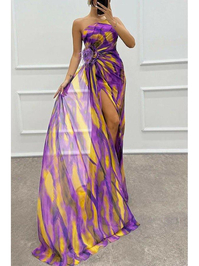 Noemi vibrant blue maxi dress by Lumina Wear, perfect for wedding guests, shown in a flowing, colorful design.