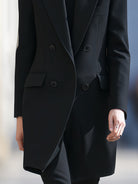 Black Lumina Vancouver double-breasted blazer with peak lapels, tailored fit, and sculpted design in XS size.