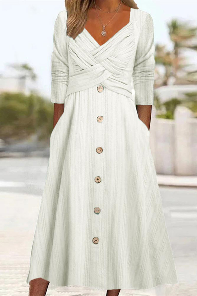 White Lumina Vancouver Beaudine A-Line mini dress with crisscross wrap neck, displayed on a mannequin.