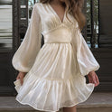Lumina Wear Sadhbh A-Line mini dress with V-neck in Vancouver green, featuring a stylish and flattering fit.