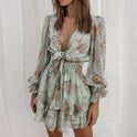 Deirdre Bella floral V-neck tie mini dress by Lumina Wear, pink with a fitted waist and flowy skirt, perfect for spring.