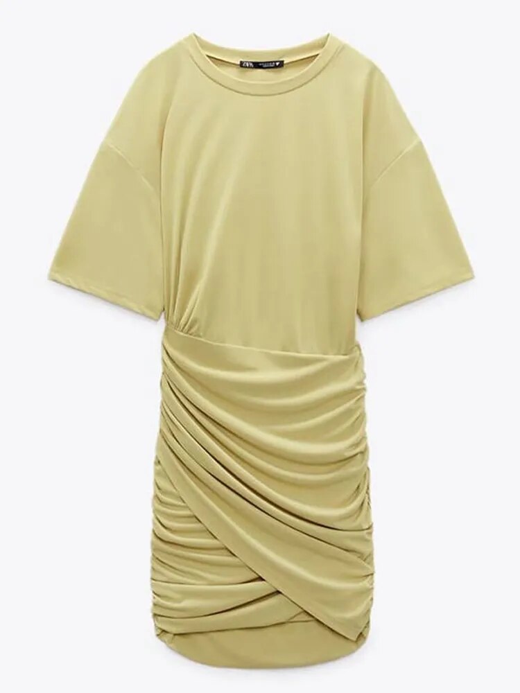 Yellow Lumina Wear Fiadh bodycon mini dress with short sleeves, fitted design, and stylish silhouette.