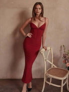 Pink Rosamond bodycon dress with corset bodice from Lumina Vancouver, showcasing its fitted silhouette and stylish design.