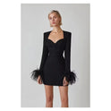 Black Nova mini cocktail dress by Lumina Wear, form-fitting with sleek design, perfect for elegant evening occasions.