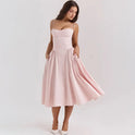 Pink Lumina Wear Nova corset midi dress with sweetheart neckline, fitted bodice, and elegant design, perfect for special occasions.