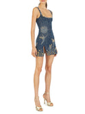 Black Nova mini dress by Lumina Wear with a square neckline, perfect for evening occasions, shown on a model.