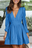 Black Nova mini dress by Lumina Wear featuring a V-neckline and puff sleeves, displayed on a hanger.