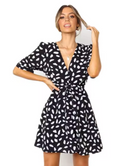 Black Nova mini dress with V-neck and waist tie from Lumina Wear, featuring a fitted silhouette and stylish design.