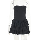 Black Iseult Noir strapless mini dress by Lumina Vancouver, shown on a model with a fitted silhouette and stylish design.