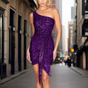 Black Nova one-shoulder sequin mini dress by Lumina Wear, featuring a sleek design and shimmering sequins on a stylish silhouette.