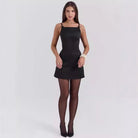 Black Verena Satin Mini Dress by Lumina Vancouver, showcasing a sleek, fitted satin mini dress with elegant design details.
