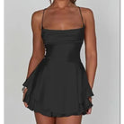 Lumina Vancouver Aine satin mini dress with cowl neck in vibrant green, showcasing sleek fabric and elegant design.