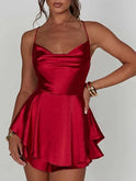 Lumina Wear Aine satin mini dress with cowl neck in vibrant green, featuring a sleek, fitted silhouette and elegant design.