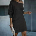 Black Olwen sequin mini dress with round neck by Lumina Wear, featuring shimmering sequins and a fitted silhouette.